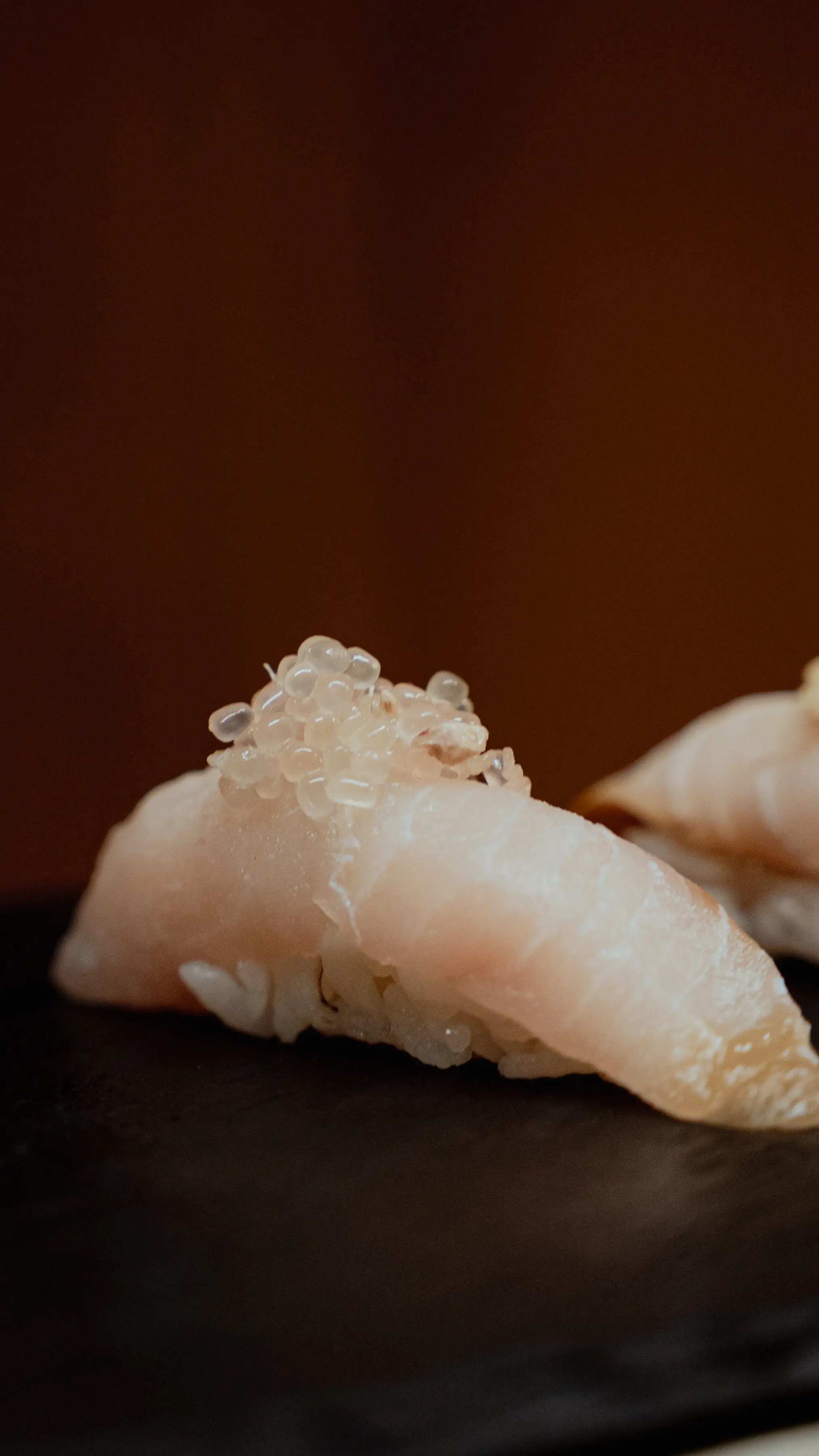 White fish nigiri with lemon caviar at Yasumi in Santa Teresa