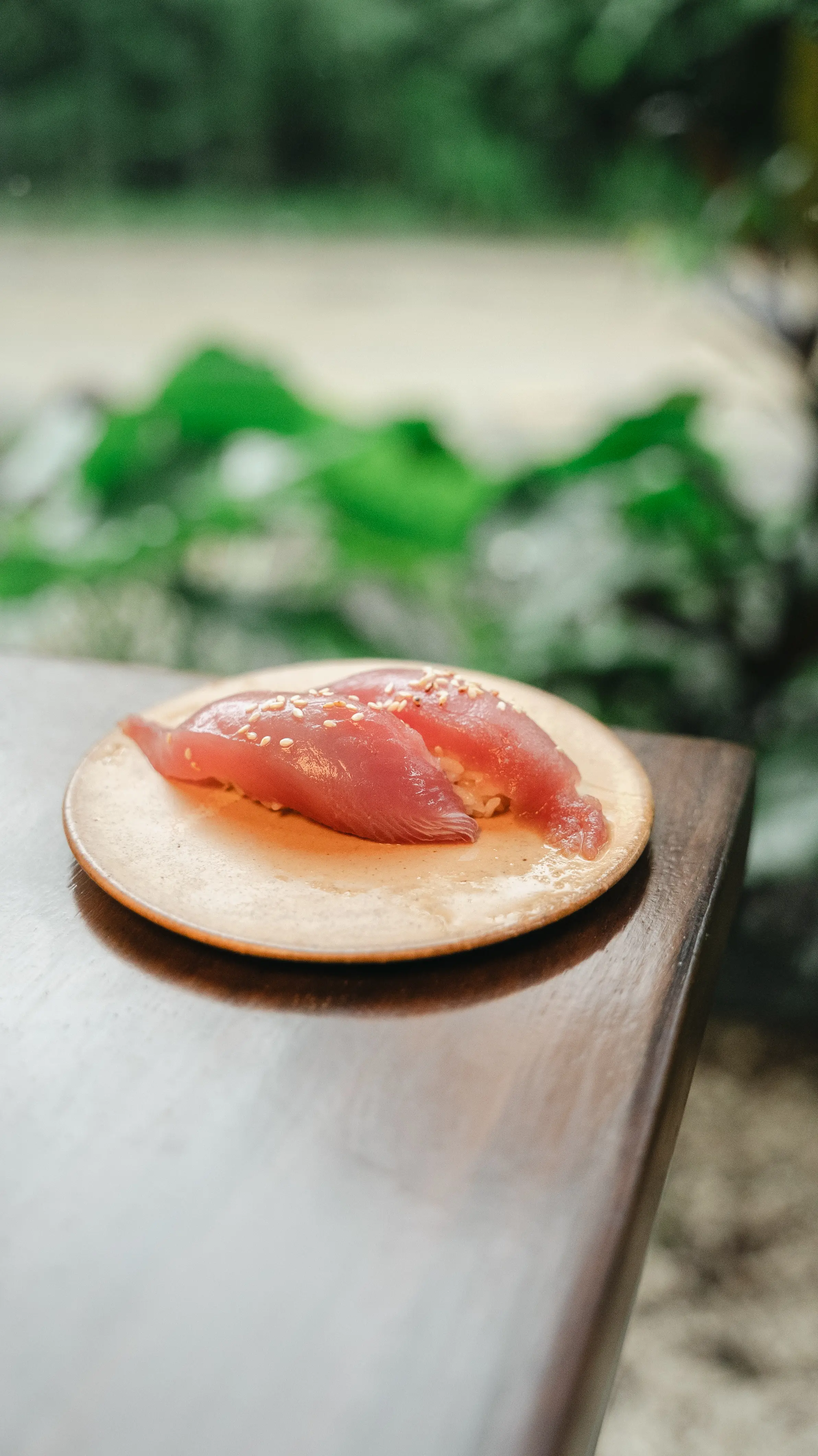 Fresh tuna nigiri with orange ponzu and sesame at Yasumi in Santa Teresa