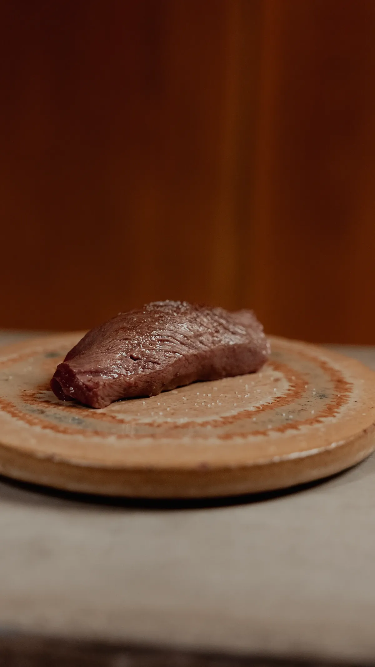 Wagyu nigiri lightly torched with sea salt at Yasumi